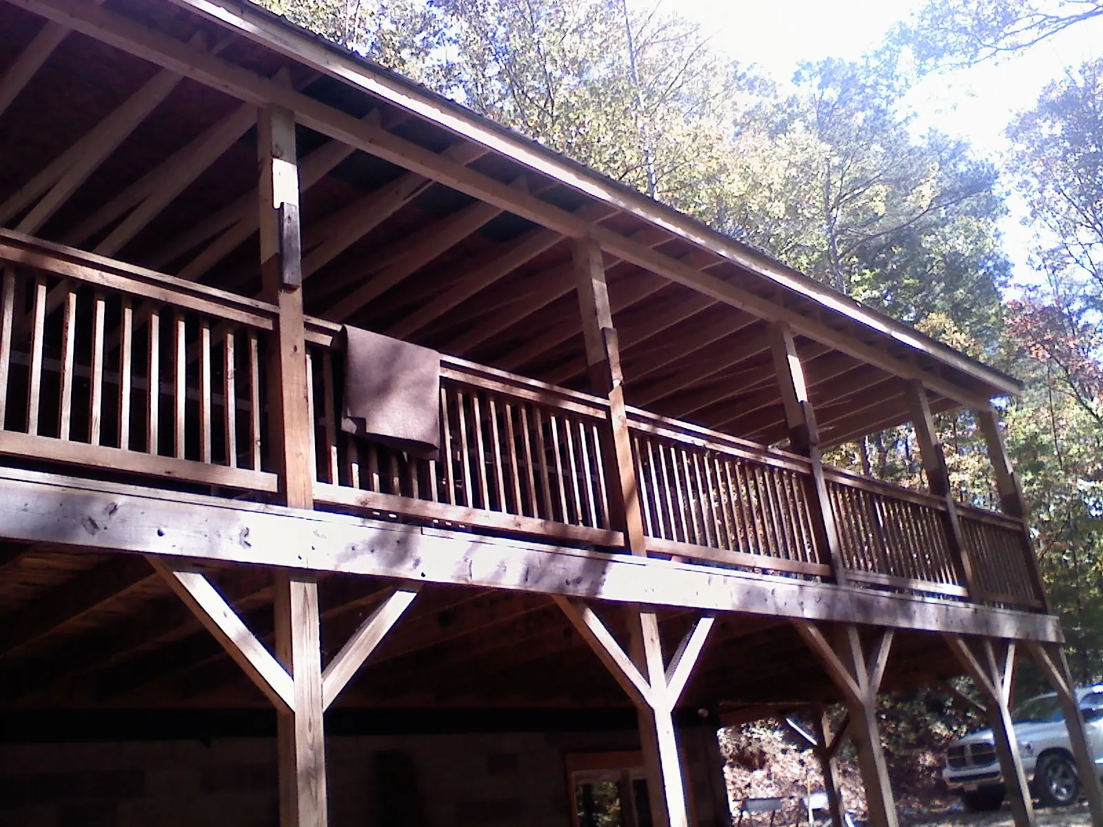 Timber framing under a new elevated porch and deck in Westminster